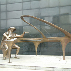 Bronze playing paino music statue1